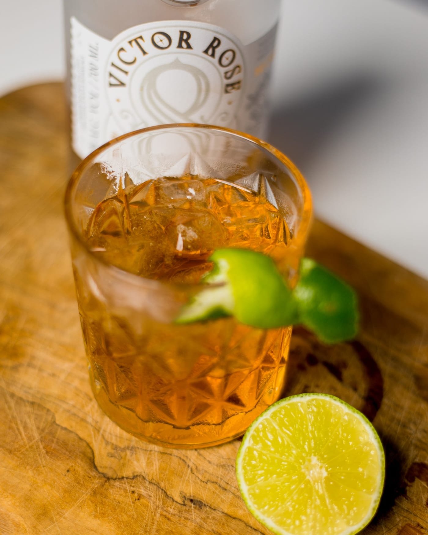 Victor Rose 8 served over ice with lime